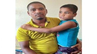 বাবা দিবসে বাবার কোল ফিরে পেলো সেই শিশুটি